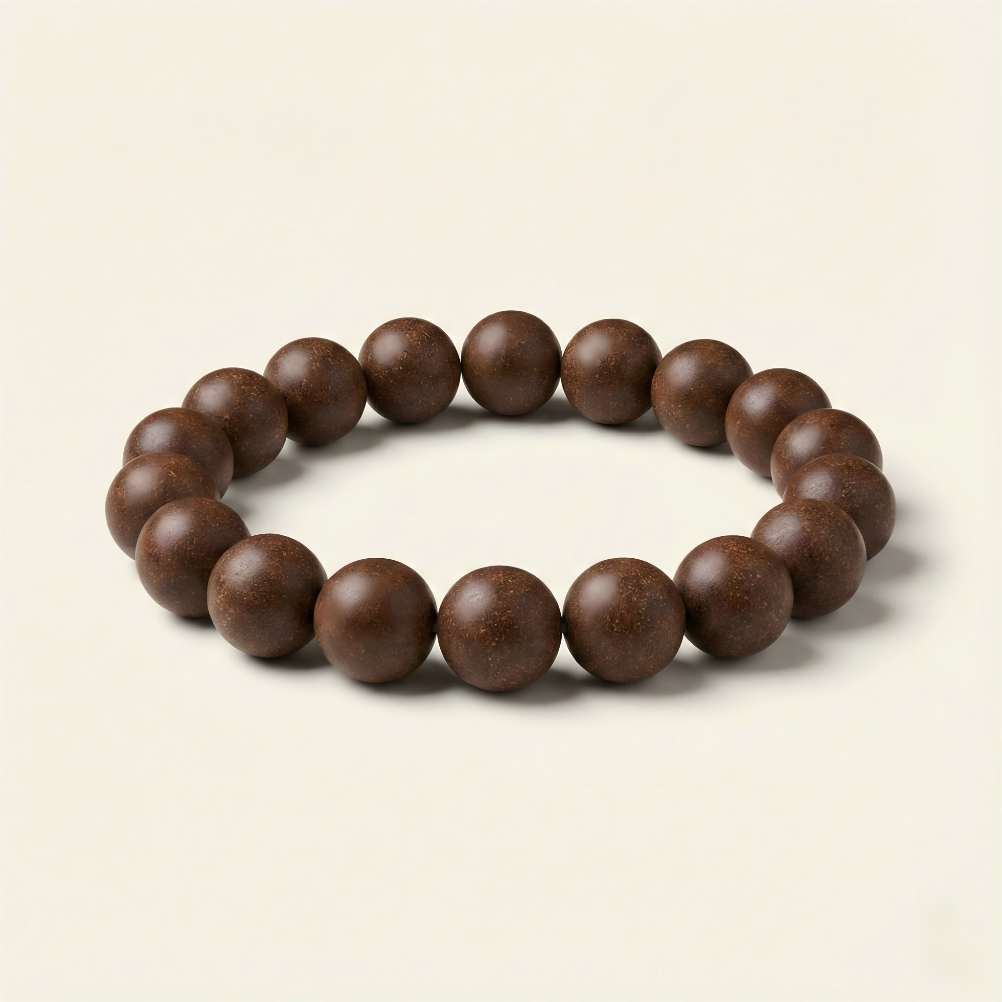 Hidden Scent handmade Golden Osmanthus herbal incense bead bracelet for mood lifting and comfort on neutral background.
